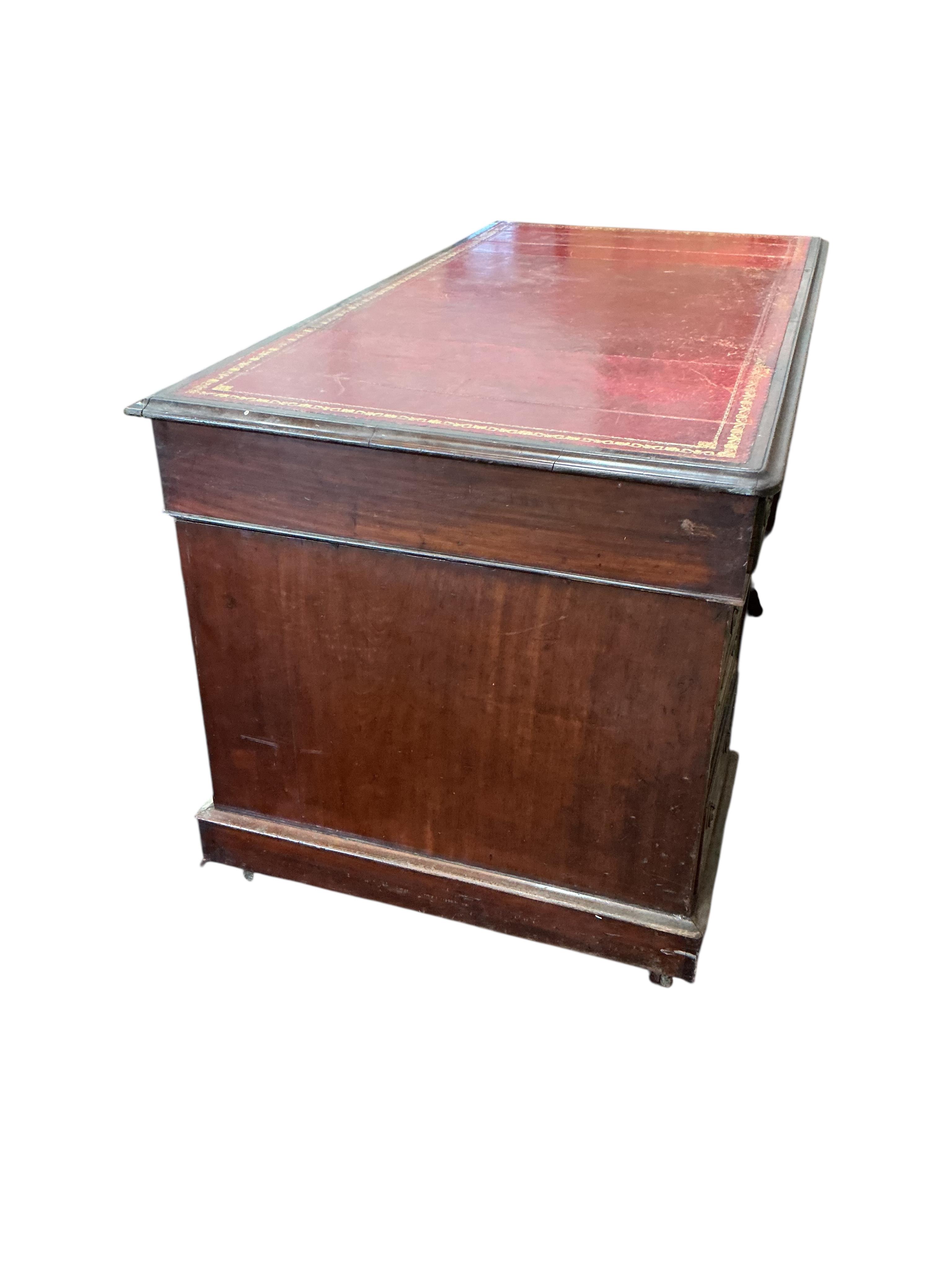 A Victorian mahogany pedestal desk, width 150cm, depth 78cm, height 79cm